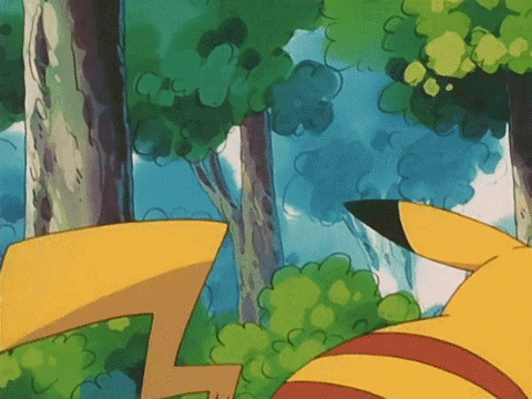 Gif of Pikachu doing a peace sign and smiling