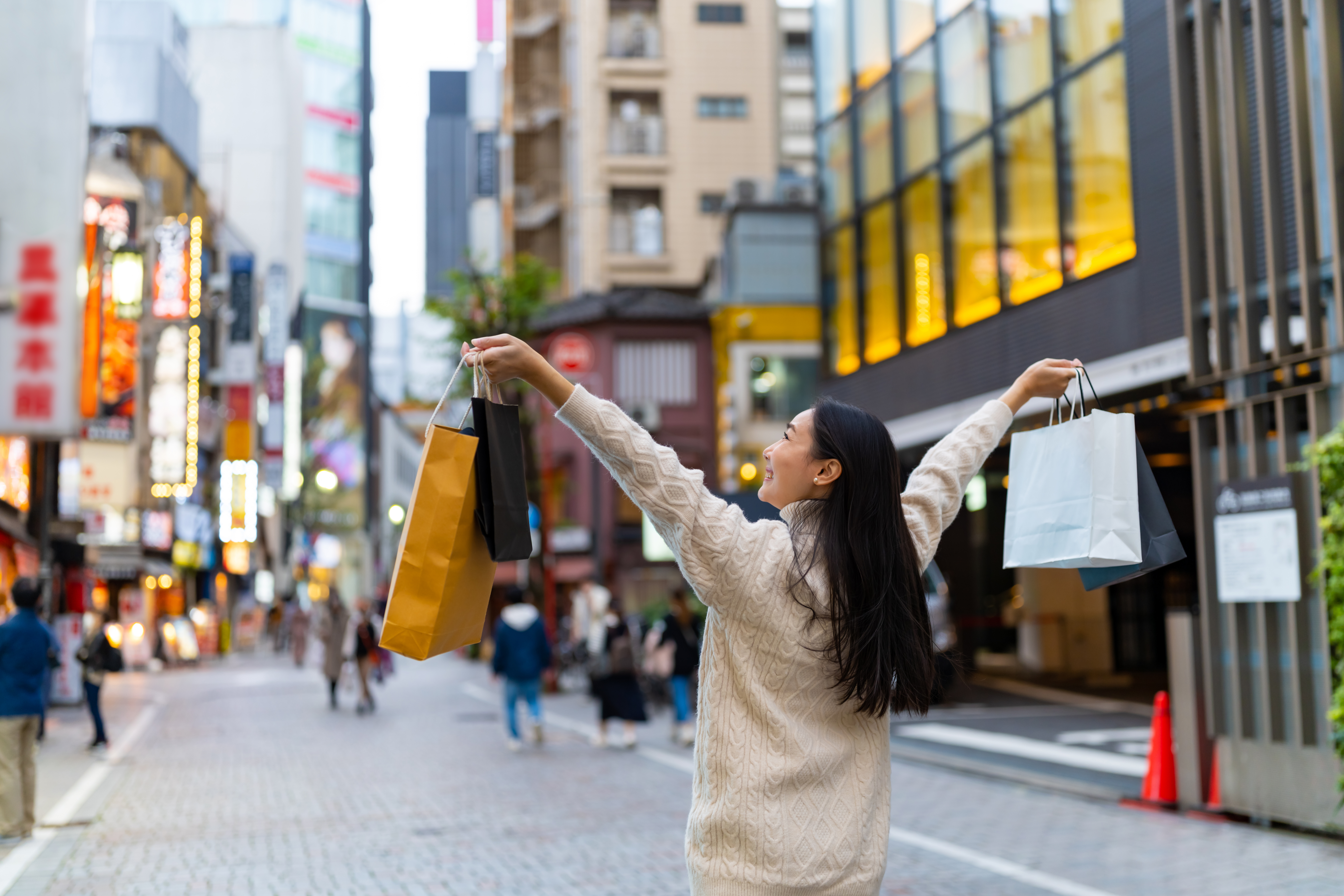 A woman with shopping bags