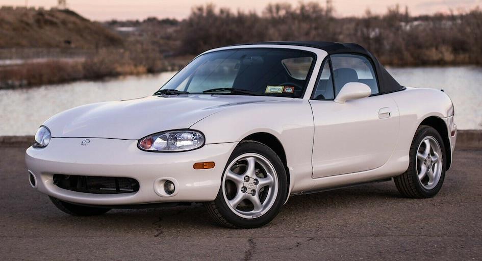 A 2000 Mazda MX-5 Miata, known for its precision handling and stylish design.
